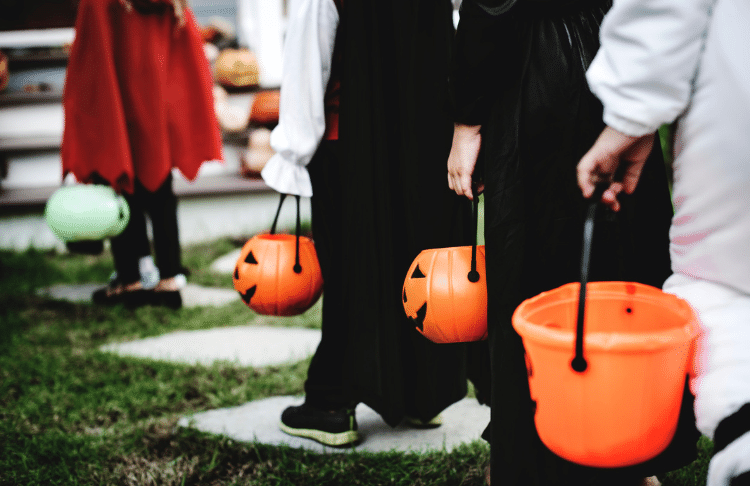 If your community isn't hosting a trick-or-treating event, host one for your halloween promotion.